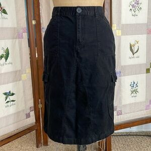 Amcan black, brushed denim, cargo skirt, large side pockets, waist 31-32